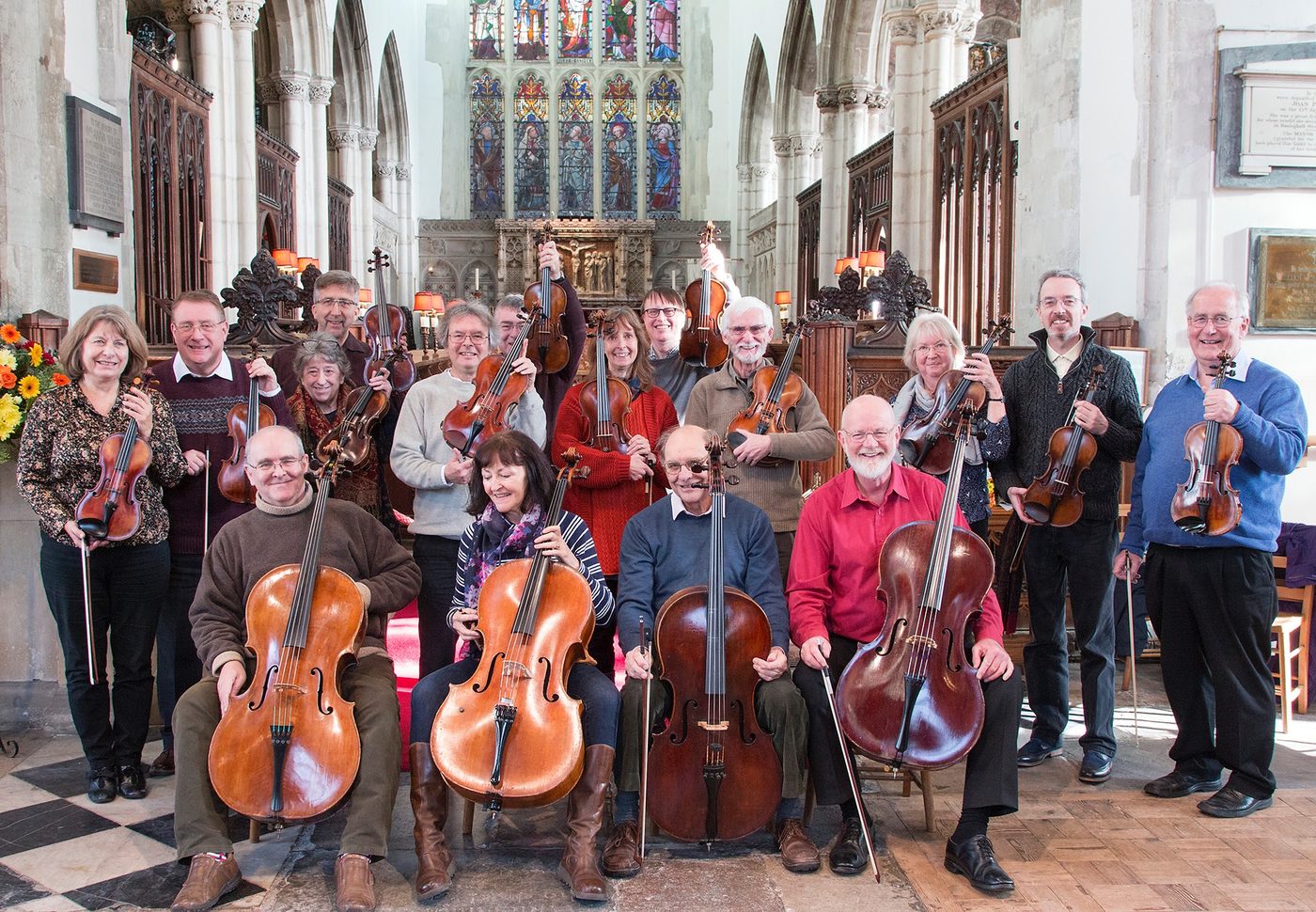 Sixteen musicians with their Banks instruments at St Thomas's Church, Salisbury